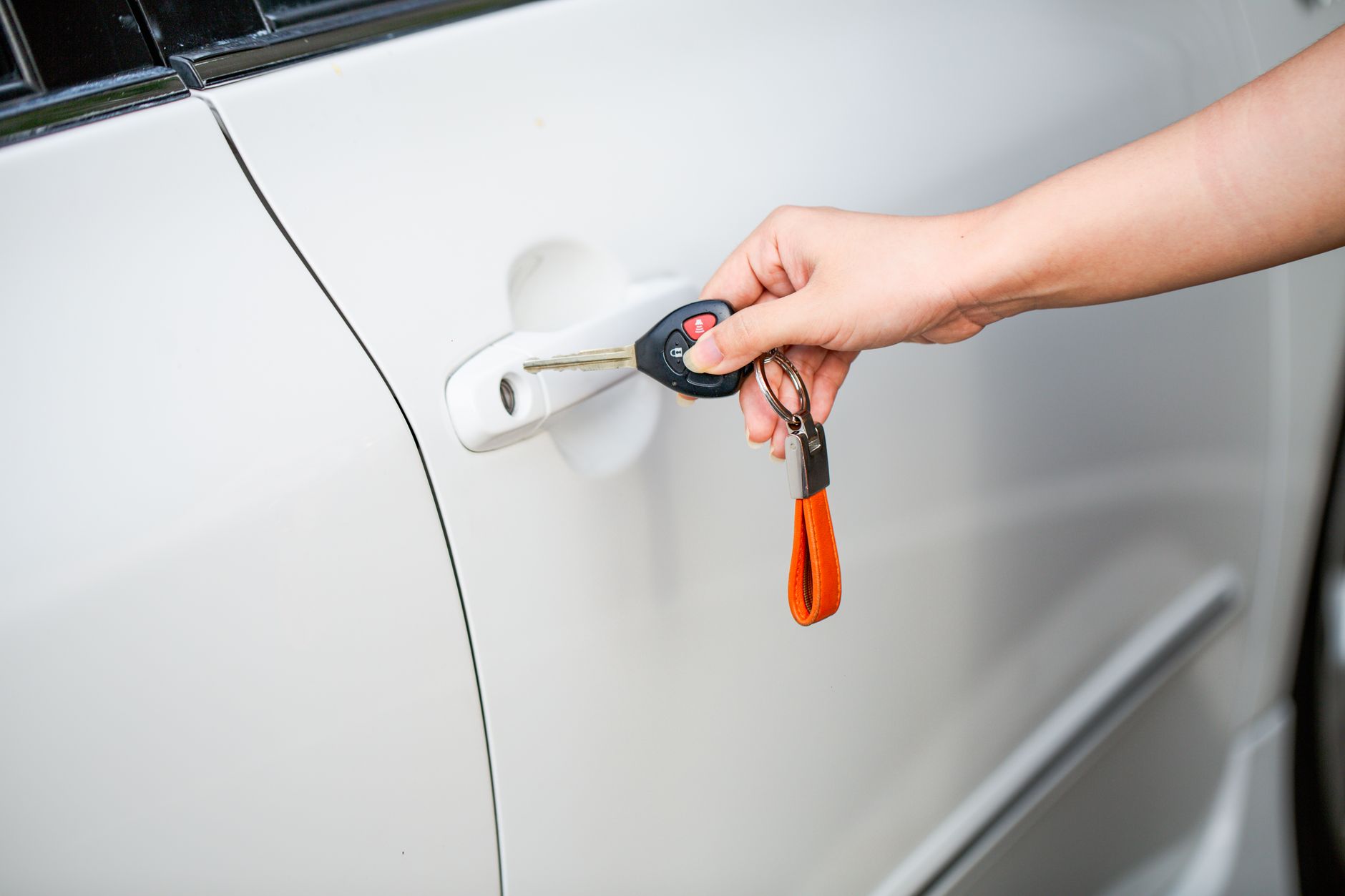 Beacon Lock & Key technician at a door in Tampa